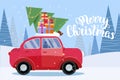 Horizontal Festive postcard with lettering - retro car with presents, christmas tree on roof. Little red car carrying Royalty Free Stock Photo