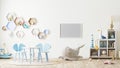 Horizontal frame mock up in children`s playroom interior with toys, kids furniture, table with chairs, shelves, scandinavian styl Royalty Free Stock Photo