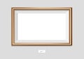 Horizontal golden frame on the wall. Vector EPS10 illustration. Wall picture frame mock-up. Royalty Free Stock Photo
