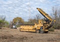 Horizontal Grinder with Log Truck During Deforestation Royalty Free Stock Photo