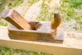 Horizontal high angle angle studio shot of small vintage old wood planer Royalty Free Stock Photo