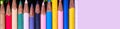 Horizontal image bright colourful pencils as fence Royalty Free Stock Photo