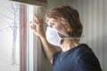 Caucasian woman wearing a protective face mask due to caronavirus Royalty Free Stock Photo