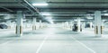 Horizontal image of clean white underground parking lot Royalty Free Stock Photo