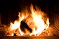 Horizontal Image of Fire Log Burning Intensively in Firepit Royalty Free Stock Photo