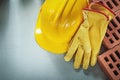 Horizontal image of red building bricks protective hard hat safe Royalty Free Stock Photo