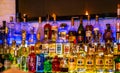 Horizontal interior view of a liquor bottles lining the shelves in a bar in Old Town in downtown Bratislava. Royalty Free Stock Photo