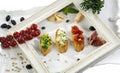 Horizontal Italian-style composition of three sandwiches