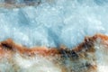 Horizontal lightened slices of blue marble quartz ice background. with brown stripe Cold calm colors icy background Royalty Free Stock Photo