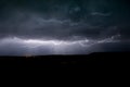 Horizontal lightning bolt is visible below the clouds of an active thunderstorm in eastern Montana Royalty Free Stock Photo