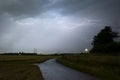 Bolts of lightning travel between the clouds