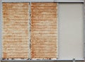 horizontal old grunge metal sheet shutter window door texture wall background. Royalty Free Stock Photo