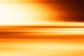Horizontal orange motion blur surface background