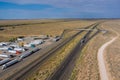 Horizontal panorama trucks stop on rest area near Interstate highway in desert Arizona Royalty Free Stock Photo