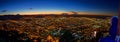 An horizontal panorama with view of the city of Bogota at dusk from Monserrate, with night lights and the Colpatria skyscraper on Royalty Free Stock Photo