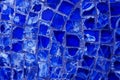 Horizontal pattern of blue street mosaic. Background from blue mosaic, broken glass. Classic blue-trend 2020