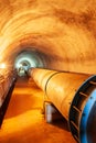 Water pipe in a mountain tunnel Royalty Free Stock Photo