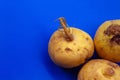 Fresh turnips close-up on a blue background. Turnips three pieces Royalty Free Stock Photo