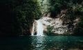 Horizontal photo of a high mountain river pool with a waterfall Royalty Free Stock Photo