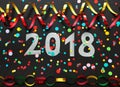 Horizontal photo with the number 2018, Confetti and paper streamers Royalty Free Stock Photo