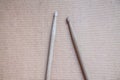 Horizontal photo of old used drumsticks on a light background Royalty Free Stock Photo