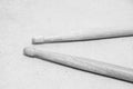 Horizontal photo of old used drumsticks on a light background Royalty Free Stock Photo