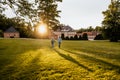 Horizontal photo of romantic couple walking with nature background