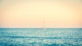 Lonely boat on the sea near Tuscany coast few minutes before dusk Royalty Free Stock Photo