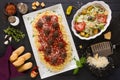 Spaghetti Dinner with Parmesan Cheese, Meatballs, Breadsticks and Salad Royalty Free Stock Photo