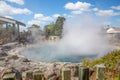 Horizontal photo of the steam of the geothermal hot springs at Whakarewarewa, The Living Maori Village set in Rotorua, New Zealand