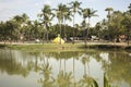 Sukhothai, Thailand - November 2017: Sukhothai Historical Park with giant Krathong in the middle of lake in the distance