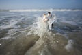 Bride and Groom Figurine on the Beach