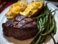 Filet Mignon with Green Beans and Twice Baked Potatoes Royalty Free Stock Photo