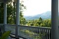 Gorgeous Mountain View from a White Columned Porch Royalty Free Stock Photo