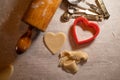 Heart Shaped Cookie Cutter with Cookie Dough and Baking Items Royalty Free Stock Photo