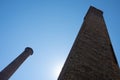 Old Red Brick Smoke Stacks at an Abandoned Mill Building Royalty Free Stock Photo