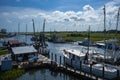 Small Fishing and Shrimp Boat Docked in Late Afternoon Sunlight Royalty Free Stock Photo