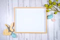 Easter product mockup with farmhouse theme on white wood background.