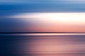 Horizontal pink and blue motion blur background