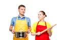 horizontal portrait of a man with a pan and a woman with a rolling pin on a white Royalty Free Stock Photo