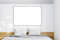 Horizontal poster in white bedroom Royalty Free Stock Photo