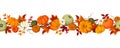 Horizontal seamless background with pumpkins and autumn leaves. Vector illustration. Royalty Free Stock Photo