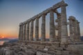 Horizontal shot of ancient Hellenistic temple columns during sunset