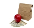 Horizontal Brown Bag With Money and Red Apple Royalty Free Stock Photo