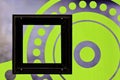 Horizontal shot of a background with beautiful green and grey circle patters and black square frame