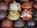 Horizontal shot of beautiful little teapots with ornaments Royalty Free Stock Photo