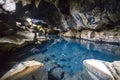 Horizontal shot of blue crystal water cave in Myvatn, Iceland