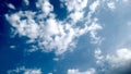 Blue Sky and puffy white & black clouds Royalty Free Stock Photo