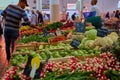 Horizontal shot of bright colourful fruit and vegetables laid out on table top in a market within Ca