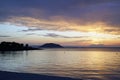 Horizontal shot. Empty beach in the evening at sunset. . Silhouettes and coastline. Sea bright sky.